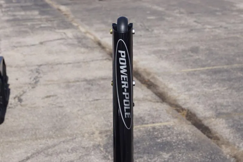 Slide: The Image of Power-Pole anchor on 2026 Phoenix 921 Elite X boat, outdoor setting. - 25