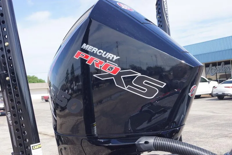 Slide: The Image of 2026 Phoenix 921 Elite X with Mercury Pro XS engine in a parking lot. - 5