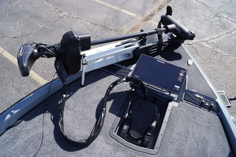 Slide: The Image of 2026 Phoenix 921 Elite X boat with Minn Kota trolling motor and advanced navigation system. - 7