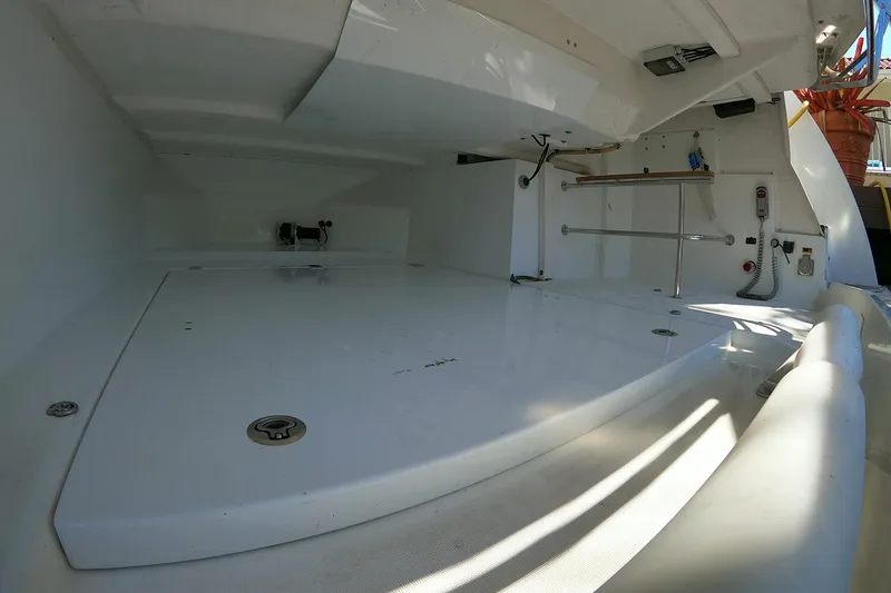 Slide: The Image of 2017 Beneteau Gran Turismo boat interior, featuring spacious white storage area. - 21