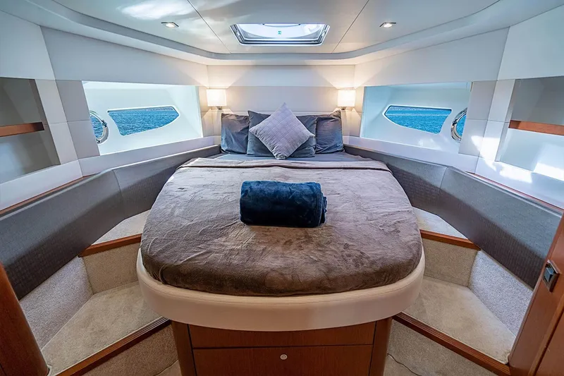 Slide: The Image of Luxurious cabin interior of 2017 Beneteau Gran Turismo yacht with cozy bedding and elegant design. - 25
