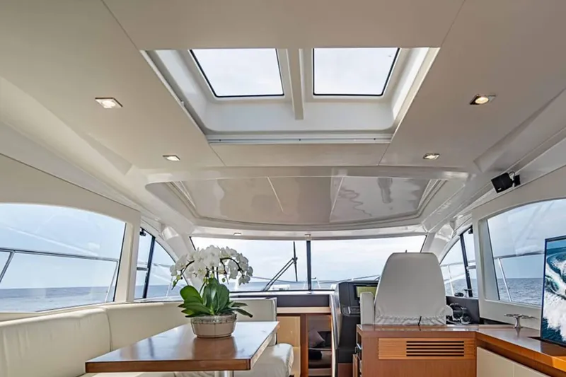 Slide: The Image of Interior of 2017 Beneteau Gran Turismo 49 yacht with skylight. - 49