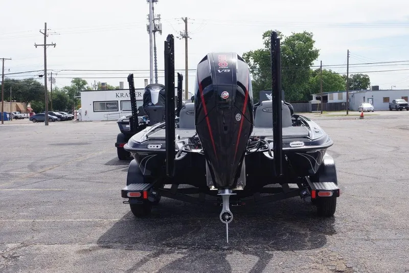 Slide: The Image of 2026 Phoenix 721 ZXL boat with V8 engine on trailer in parking lot. - 12