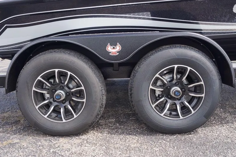 Slide: The Image of 2026 Phoenix 721 ZXL trailer wheels with stylish rims and logo on black body. - 3