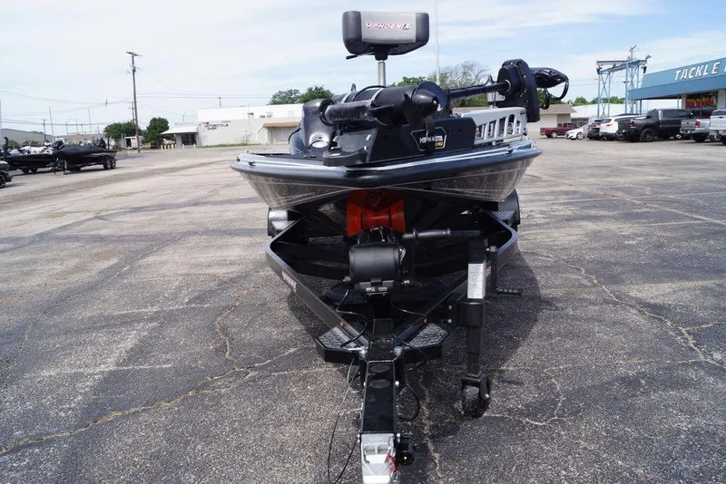 Slide: The Image of 2026 Phoenix 721 ZXL boat parked in a lot, front view. - 4