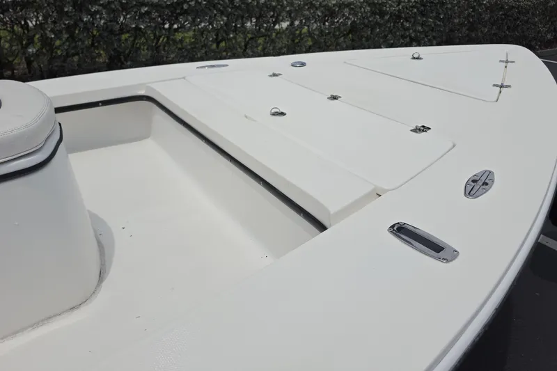 Slide: The Image of 2016 Aqua Dyne 17 boat deck with storage compartments and seating. - 14
