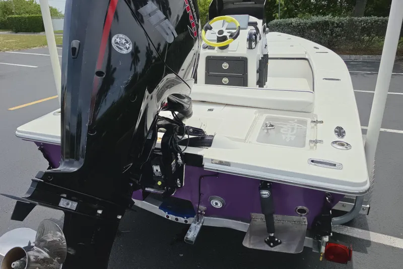 Slide: The Image of Aqua Dyne 17 boat, 2016 model, featuring a powerful outboard motor and sleek design. - 15