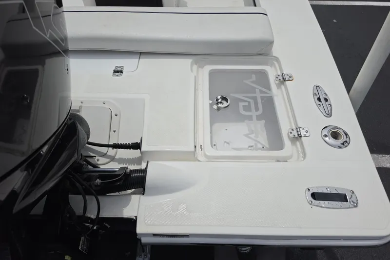 Slide: The Image of 2016 Aqua Dyne 17 boat deck with engine and storage compartment. - 16