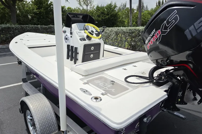 Slide: The Image of Aqua Dyne 17 boat, 2016 model, with Mercury Pro XS engine, parked on a trailer. - 5
