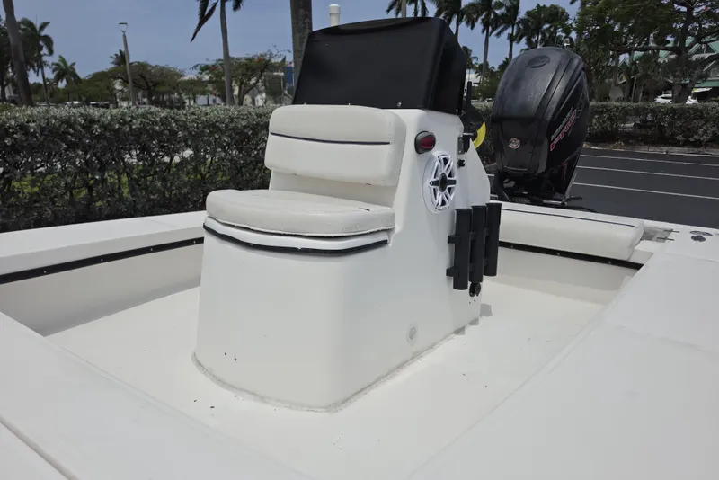 Slide: The Image of 2016 Aqua Dyne 17 boat with seating and outboard motor in a tropical setting. - 9