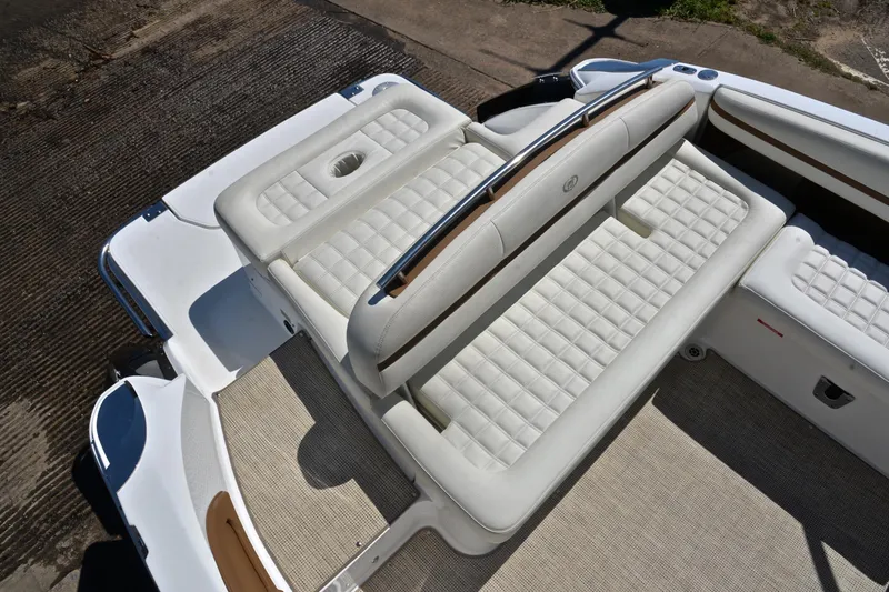 Slide: The Image of 2018 Cobalt R7 boat with luxurious white seating and spacious deck layout. - 24