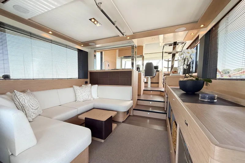 Slide: The Image of Luxurious interior of 2026 Beneteau Swift Trawler 54 with modern seating and decor. - 3