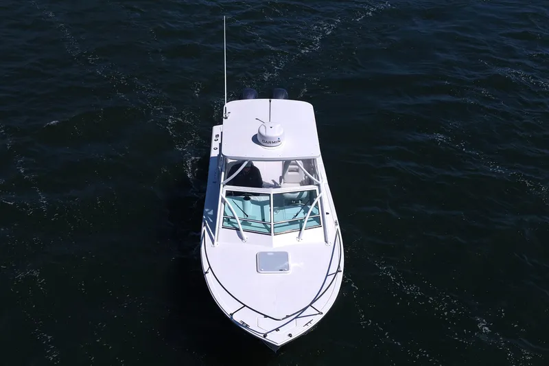 Slide: The Image of 2018 Albemarle 25 Express boat cruising on open water, aerial view. - 14