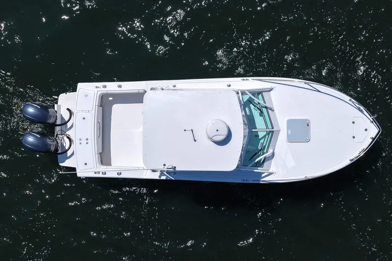 Slide: The Image of Overhead view of 2018 Albemarle 25 Express boat on water. - 18
