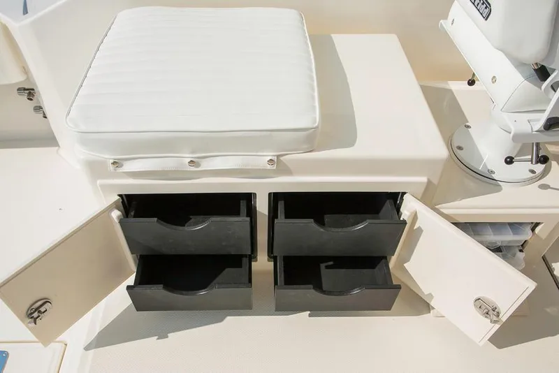 Slide: The Image of Manufacturer Provided Image: 2018 Albemarle 25 Express boat storage drawers and cushioned seat. - 22
