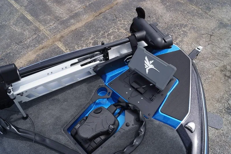 Slide: The Image of 2026 Skeeter ZXE21 boat deck with advanced control panel and trolling motor. - 13
