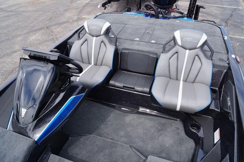 Slide: The Image of 2026 Skeeter ZXE21 boat interior with dual gray seats and modern dashboard. - 16