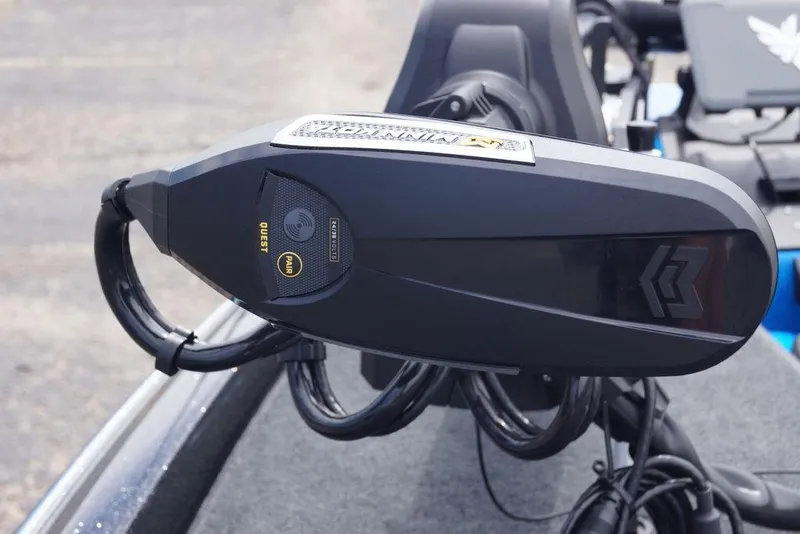 Slide: The Image of Close-up of a 2026 Skeeter ZXE21 boat motor with advanced controls. - 17