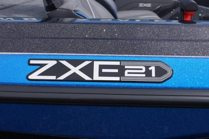 Slide: The Image of 2026 Skeeter ZXE21 boat logo on a sparkling blue surface. - 6