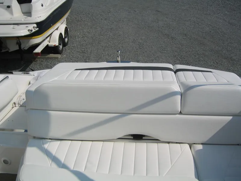 Slide: The Image of White seating on a 2008 Regal 2250 Cuddy boat. - 2