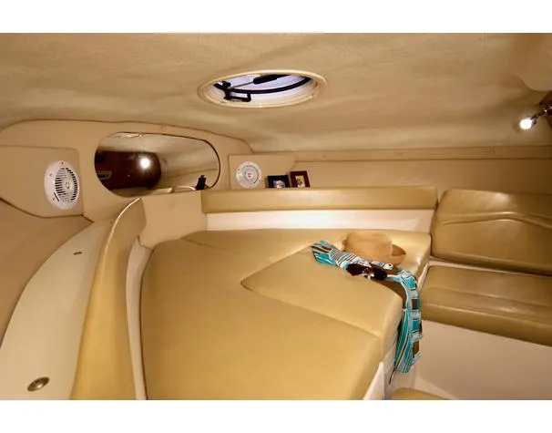 Slide: The Image of Interior of 2008 Regal 2250 Cuddy boat with beige seating. - 7