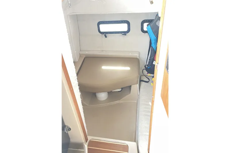 Slide: The Image of Interior cabin of 2019 Ranger Tugs R-31 CB with compact seating and windows. - 27