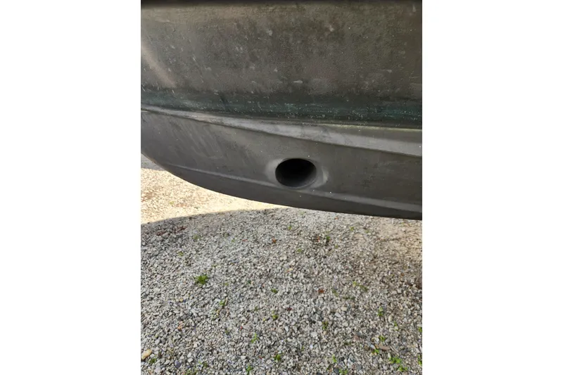 Slide: The Image of Close-up of 2019 Ranger Tugs R-31 CB hull with drainage hole. - 47
