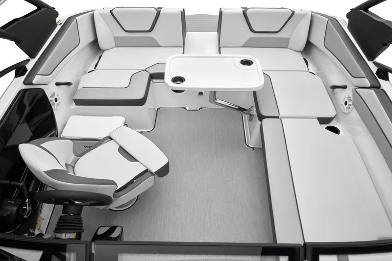 Slide: The Image of Interior of 2024 Yamaha AR220 boat with seating area and table. - 29
