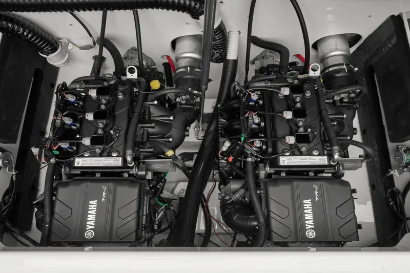 Slide: The Image of 2024 Yamaha AR220 boat engine compartment, dual engines. - 30