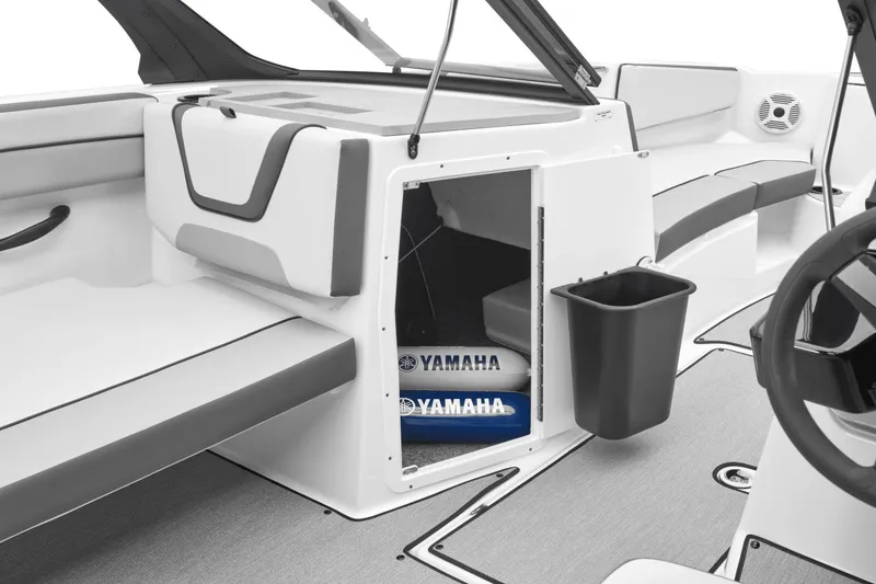 Slide: The Image of Interior of Yamaha AR220 boat, 2024 model, featuring storage and seating area. - 33