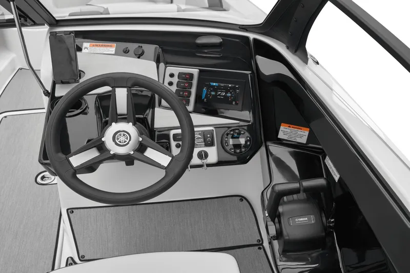 Slide: The Image of Yamaha AR220 2024 boat console with steering wheel and controls. - 36