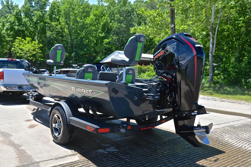 Slide: The Image of 2025 Ranger RT188 boat with powerful engine on trailer, ready for launch. - 12