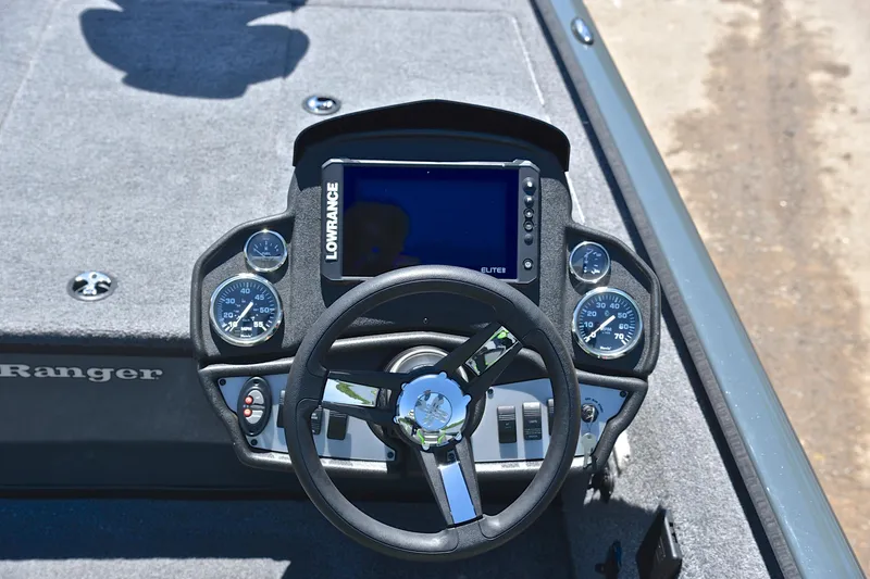 Slide: The Image of 2025 Ranger RT188 boat dashboard with Lowrance Elite display and gauges. - 25