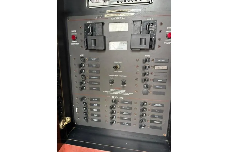 Slide: The Image of Electrical control panel on a 2001 Wellcraft 3300 Martinique boat. - 11
