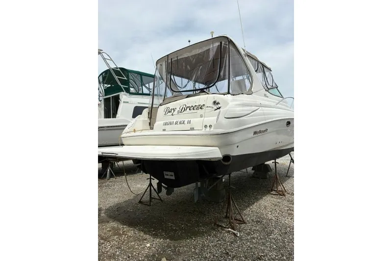 Slide: The Image of 2001 Wellcraft 3300 Martinique boat on stands, rear view, Virginia Beach. - 4