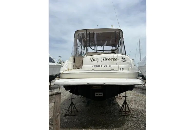Slide: The Image of 2001 Wellcraft 3300 Martinique boat named "Bay Breeze" in dry dock, Virginia Beach. - 5