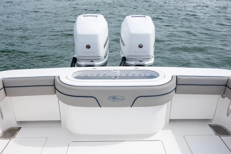 Slide: The Image of 2022 Valhalla Boatworks V-33 with twin outboard engines on open water. - 14