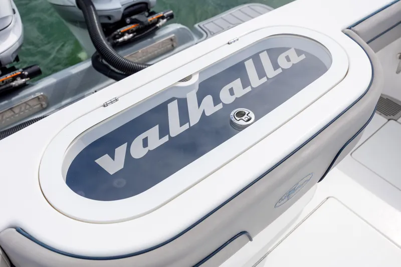 Slide: The Image of 2022 Valhalla Boatworks V-33 livewell with logo, featuring sleek design and modern features. - 15