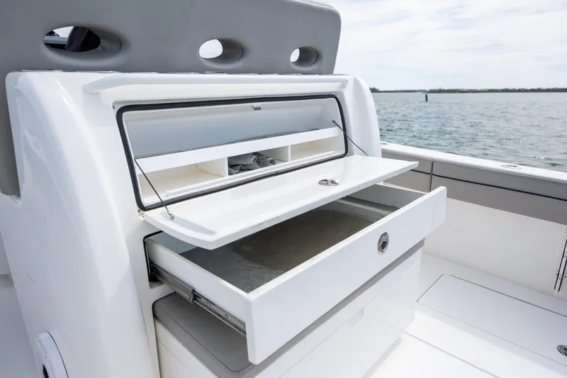 Slide: The Image of 2022 Valhalla Boatworks V-33 with open storage compartment on deck. - 20