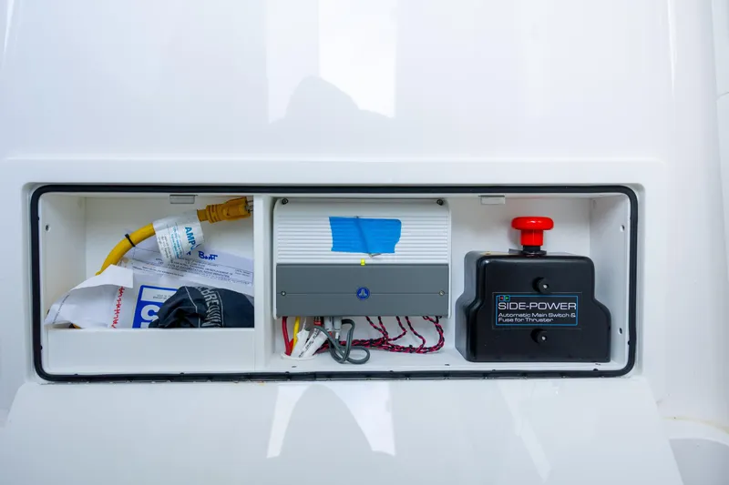 Slide: The Image of Electrical compartment of 2022 Valhalla Boatworks V-33 with Side-Power switch and wiring. - 41