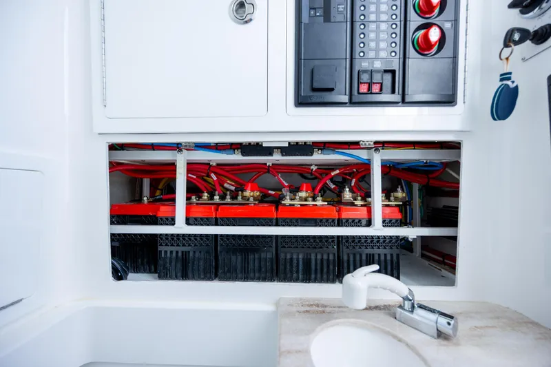 Slide: The Image of Electrical panel and battery compartment of 2022 Valhalla Boatworks V-33. - 42
