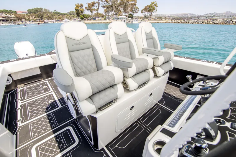 Slide: The Image of Luxurious seating on Invincible 35 Catamaran, 2021 model, on open water. - 13