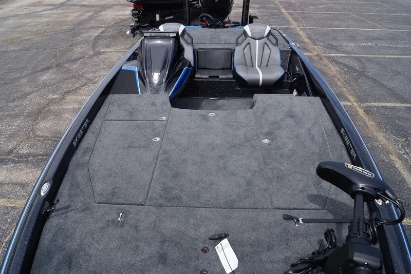 Slide: The Image of 2026 Skeeter ZXE21 fishing boat with spacious deck and modern seating. - 16