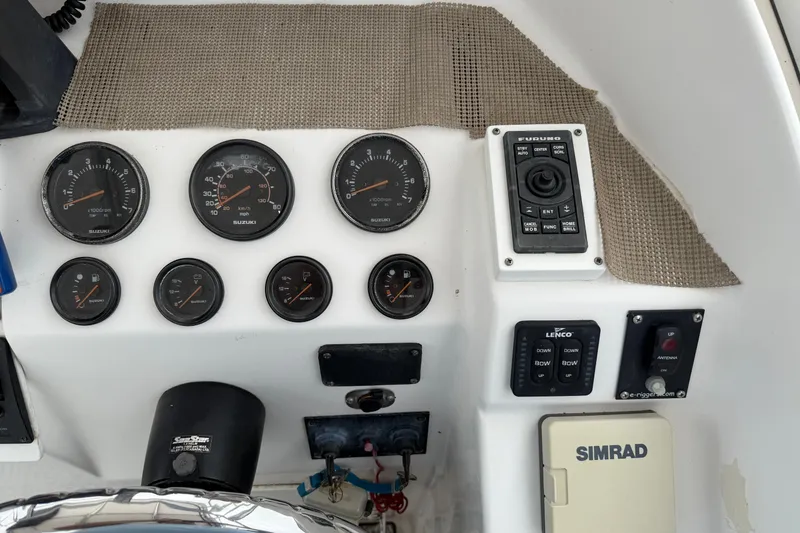Slide: The Image of 2004 Pro Sports 2660 WA ProKat dashboard with gauges and controls. - 28