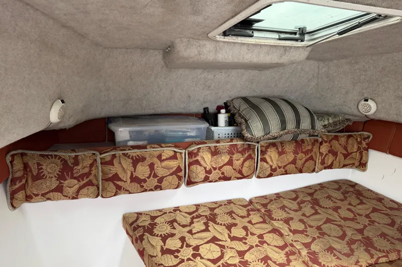 Slide: The Image of Interior cabin of 2004 Pro Sports 2660 WA ProKat with cushions and storage. - 37