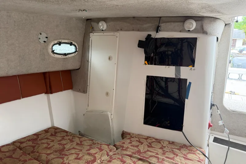 Slide: The Image of Interior cabin of 2004 Pro Sports 2660 WA ProKat boat with wiring access panels. - 38
