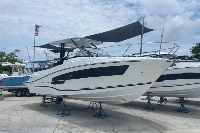The Image of 2026 Jeanneau Leader 9.0 WA Series 2 boat on stands, outdoor display. - 0