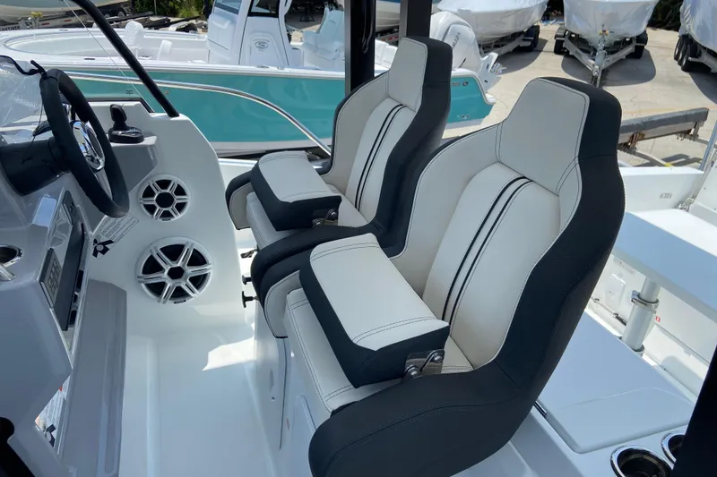Slide: The Image of 2026 Jeanneau Leader 9.0 WA Series 2 cockpit with dual seats and modern dashboard. - 16