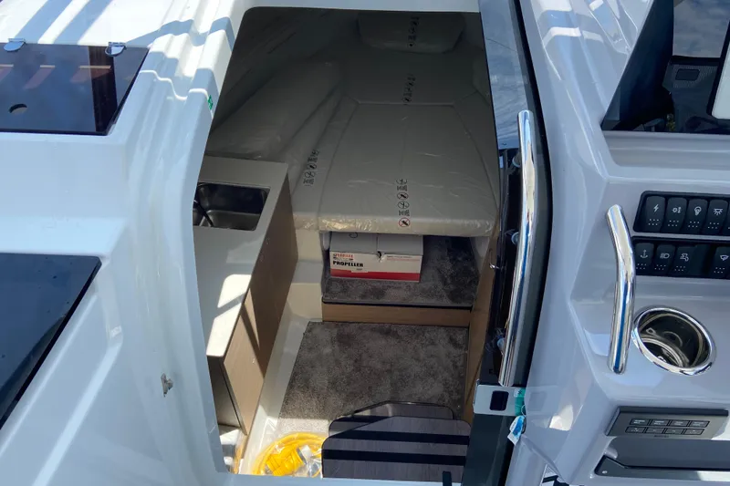 Slide: The Image of Interior view of 2026 Jeanneau Leader 9.0 WA Series 2 boat cabin. - 29