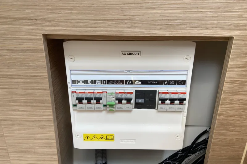 Slide: The Image of Electrical panel on Jeanneau Leader 9.0 WA Series 2, 2026 model, showcasing circuit breakers. - 39
